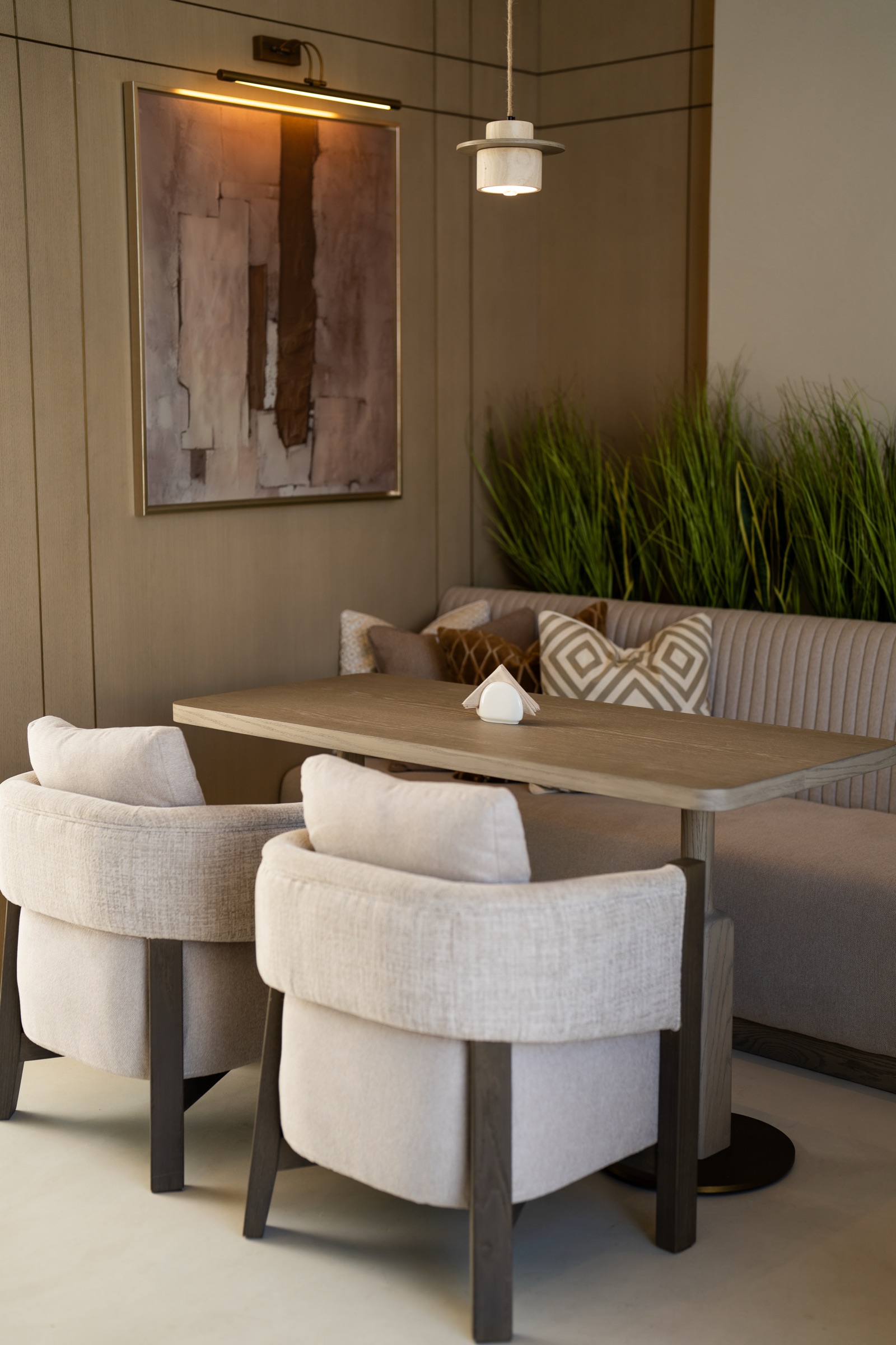 Banquette seating under warm light