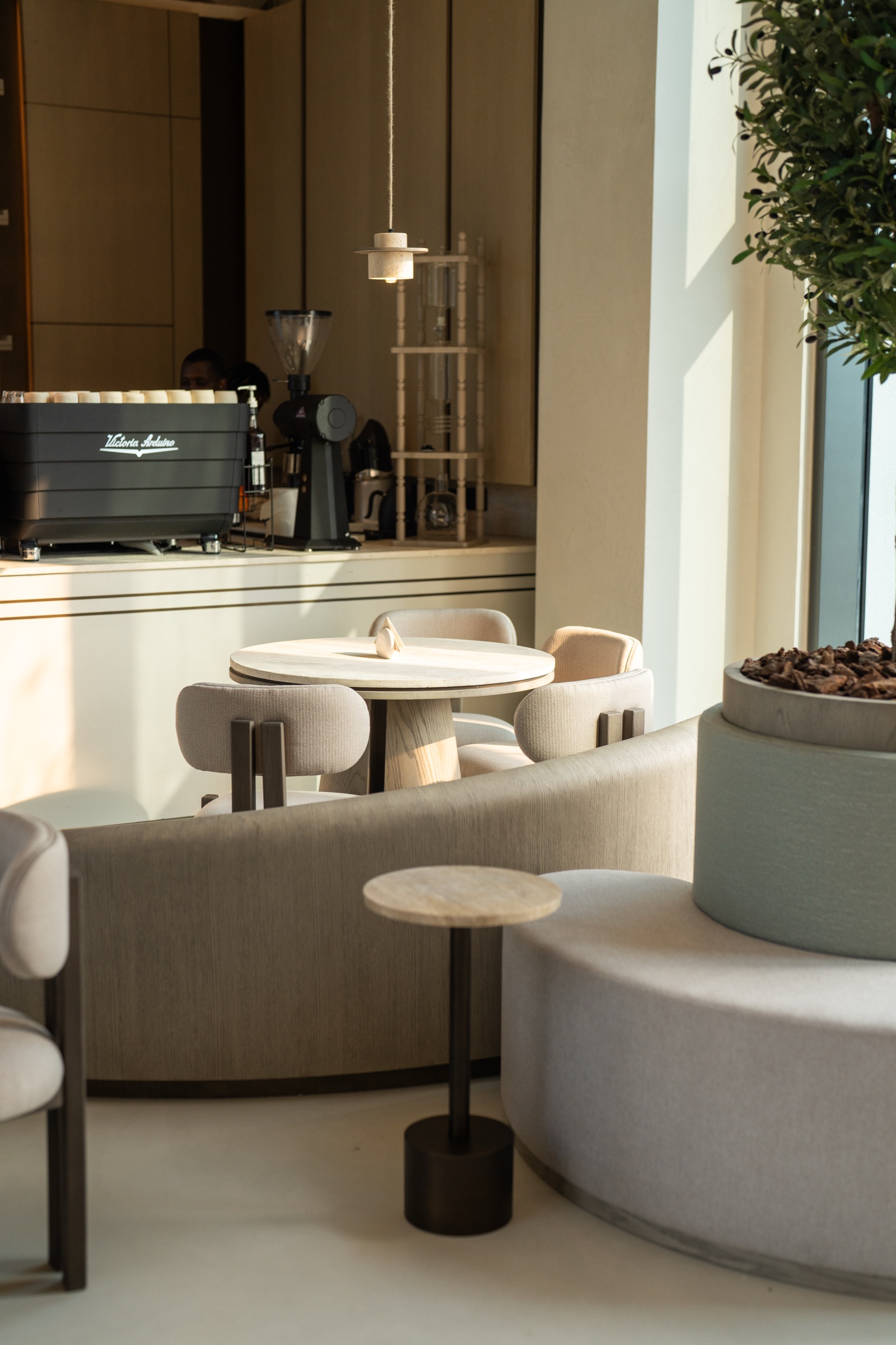 Curved lounge seating and the espresso bar at KBH
